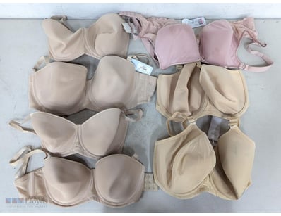 Assorted bras, pink and nude colours, sizes range ...