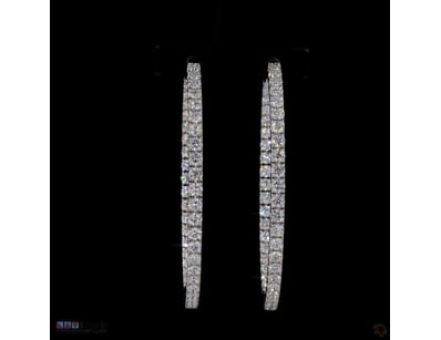 5.54 CT ROUND PAVÉ INSIDE-OUT HOOP EARRINGS IN 9KT...