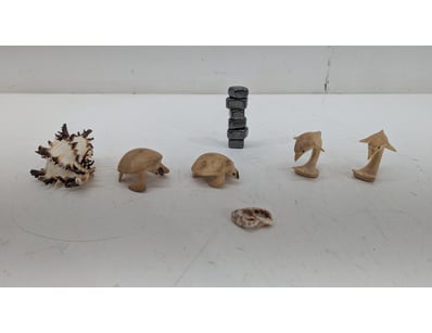 COLLECTION OF CARVED BONE  MARINE FIGURINES , SHEL...