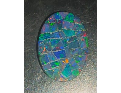 2.7 CARATS COOBER PEDY MOSAIC OPAL DOUBLET   

Dim...