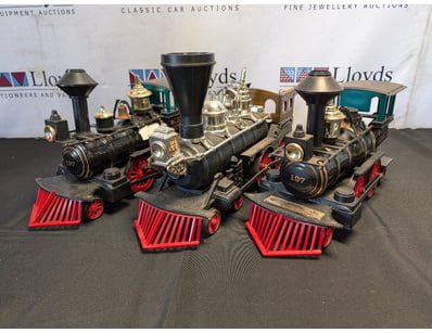 COLLECTION OF TRAIN JIM BEAM WHISKY DECANTERS

C...