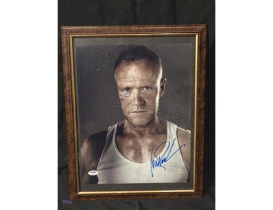 THIS IMAGE FEATURES A FRAMED, AUTOGRAPHED PHOTOGRA...