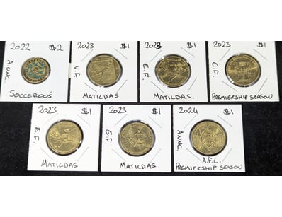 SEVEN AUSTRALIAN SPORTING ONE AND TWO DOLLAR COINS...