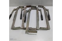 Set of five metal C-clamps with cast iron frames