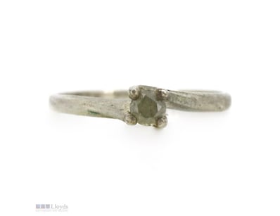 STERLING SILVER AND DIAMOND, SOLITAIRE RING.      ...