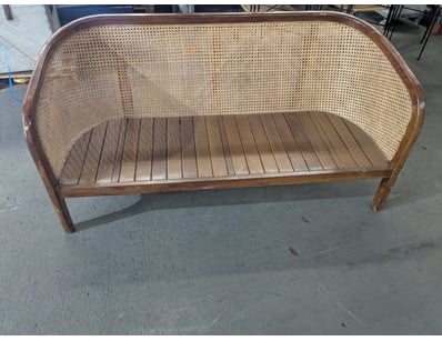 bBarrel-back sofa featuring a curved wooden frame ...