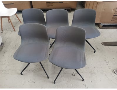 Set of five modern dining chairs featuring grey up...