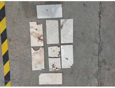 Collection of travertine tiles displaying natural ...