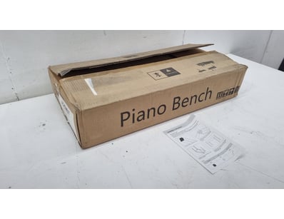 piano bench in original cardboard packaging. Featu...