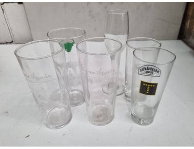 Collection of six promotional beer glasses featuri...