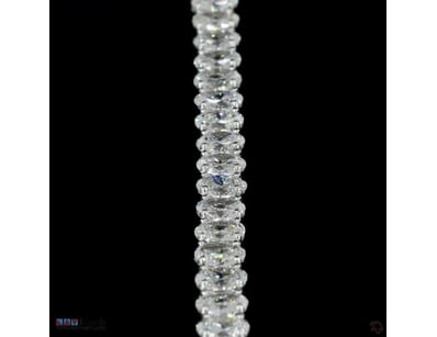 6.17 CT OVAL TENNIS BRACELET IN 10KT WHITE GOLD 

...