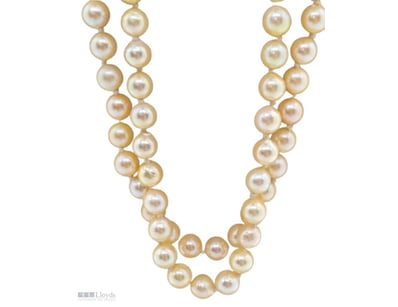 OPERA LENGTH TWO-TIERED CHAMPAGNE PEARL NECKLACE

...