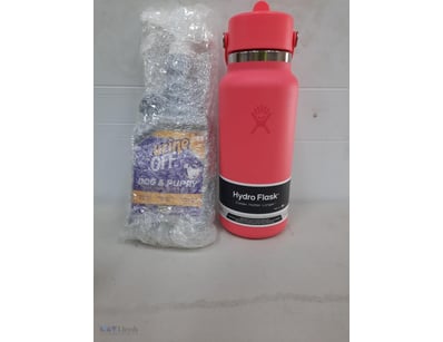 Urine off dog and puppy and htdroflask pink.

SOLD...