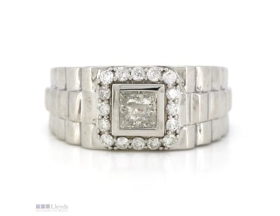 14K WHITE GOLD AND DIAMOND, GENTS RING.      

The...