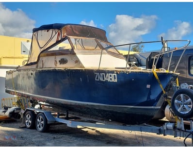 2006 Homemade Wooden Boat on Trailer

Year: 2006...