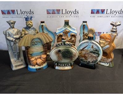 COLLECTION OF JIM BEAM CERAMIC WHISKY DECANTERS
...