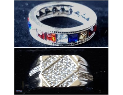 2 SILVER COLOUR RINGS WITH ZIRCONIAS        

Cond...