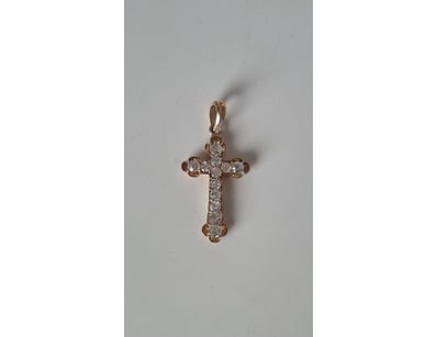 10CT ROSE GOLD DIAMOND CROSS PENDANT

An Elegant...
