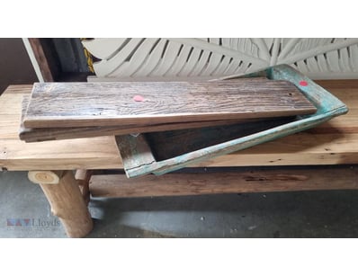 Rustic wooden serving tray with weathered patina a...