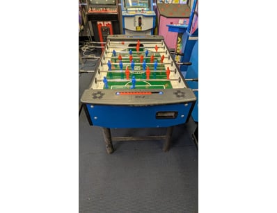 This FAS Sports Smile soccer table features a blue...