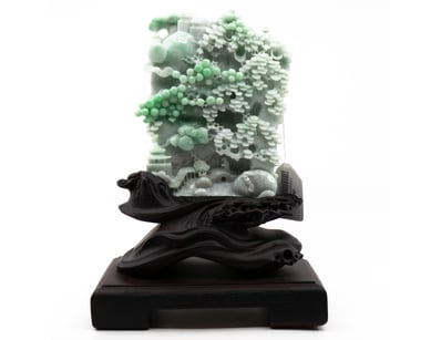 NATURAL BURMESE JADE SCULPTURE.      

The Jade De...