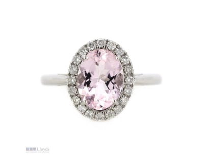 14K WHITE GOLD, MORGANITE AND DIAMOND RING.      
...