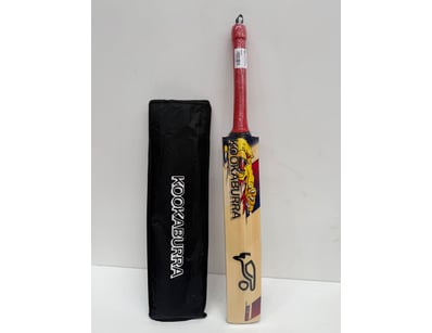 Kookaburra cricket bat in natural wood finish feat...