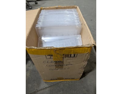 Bulk lot of clear plastic hinged clamshell contain...