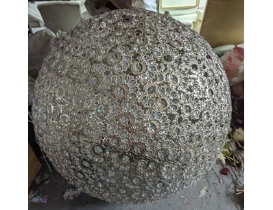 Stunning crystal chandelier featuring an ornate sp...