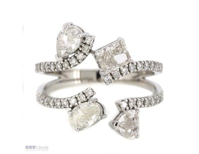 14K WHITE GOLD AND DIAMOND, TWIST BAND RING.      ...