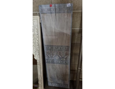 decorative wall panel featuring a striking blue-gr...