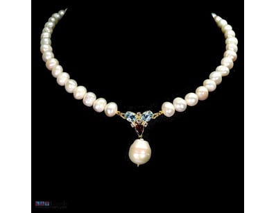 NATURAL PEARL TOPAZ & GARNET NECKLACE.     

Natur...
