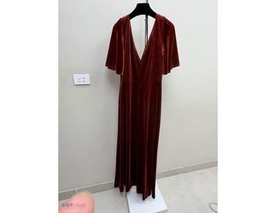 BURGUNDY VELVET EVENING GOWN WITH FLUTTER SLEEVES
...