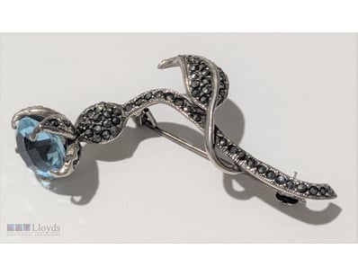 STERLING SILVER & MARCASITE FLOWER BROOCH     

Ma...