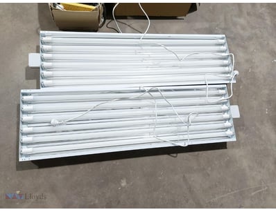 Lot comprises two fluorescent light panel fixtures...