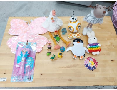 Collection of children's toys and collectibles fea...
