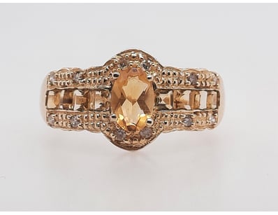 10K GOLD RING WITH CITRINE CENTRE, BRIDGE GEMS AND...