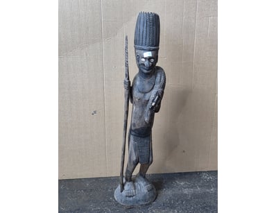 Figurine, Tribal carved timber figure depicting a ...