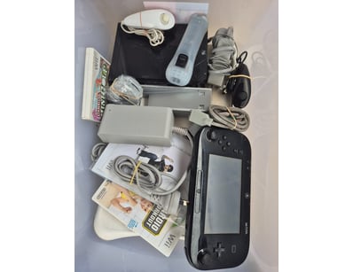 Nintendo Wii U console bundle featuring black Wii ...