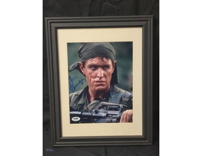THIS FRAMED DISPLAY FEATURES AN AUTOGRAPHED PHOTO ...