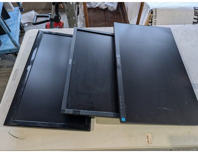 Lot of three computer monitors, various models.
...