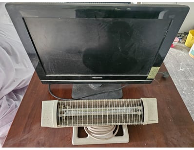 Computer monitor and electric heater

Sold as lot
...