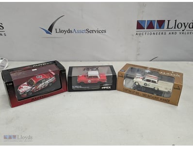 COLLECTION OF FOUR DIECAST MODEL RACING CARS - BAT...