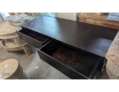 Modern dark-stained timber draw unit featuring two...