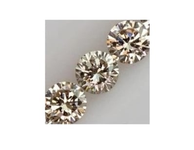 0.11 TCW LIGHT BROWN ROUND DIAMOND        

Condit...