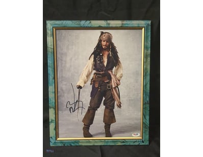 AUTOGRAPHED PHOTOGRAPH OF JOHNNY DEPP AS CAPTAIN J...