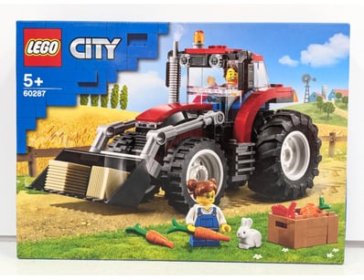 LEGO City set 60287 featuring a detailed red and b...