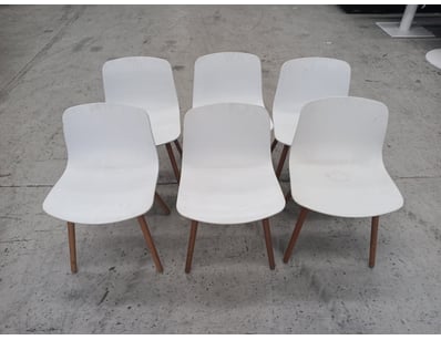 Set of six modern dining chairs featuring white mo...