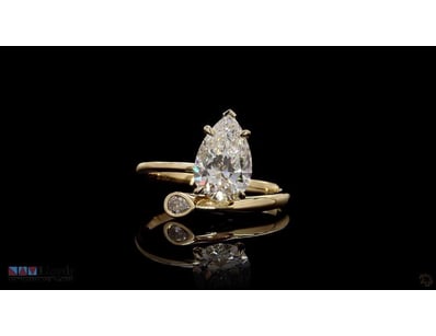 2.11 CT PEAR BYPASS SOLITAIRE RING IN 18KT YELLOW ...