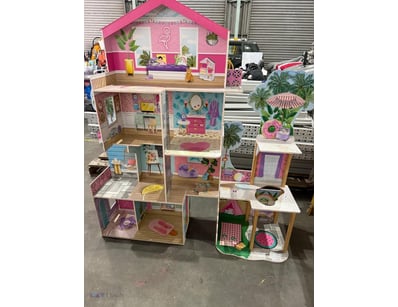 KidKraft multi-level dollhouse featuring vibrant p...
